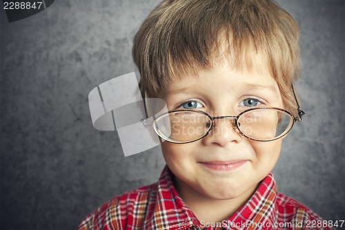 Image of boy with glasses