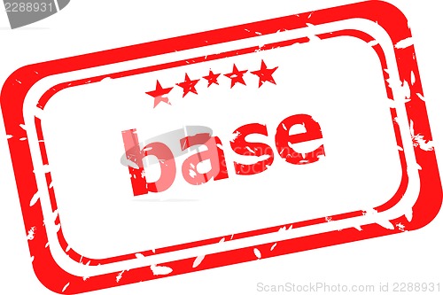 Image of base on red rubber stamp over a white background