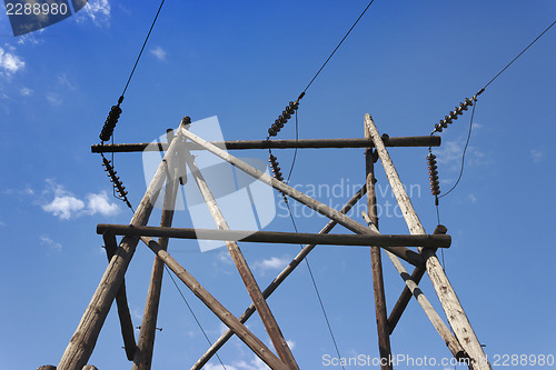 Image of Wooden pillar of electricity transmission line