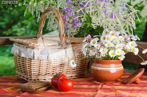 Image of Summer   still life with flowers and food