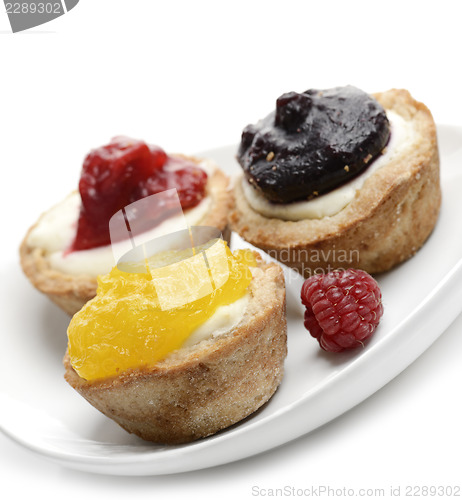 Image of Lemon ,Blueberry And Raspberry Cheesecakes