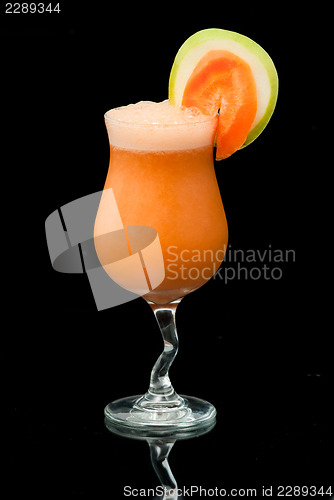 Image of cocktail with carrot and apple closeup