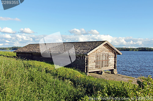 Image of Old Boat House by Lake