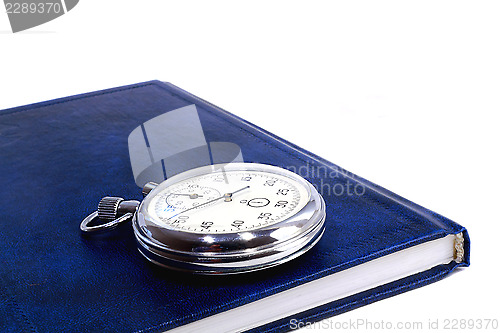 Image of Stopwatch and the notebook on a white background