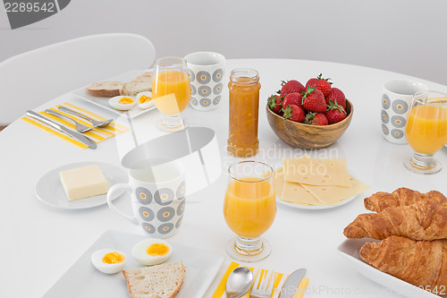 Image of Simple tasty breakfast on a white table