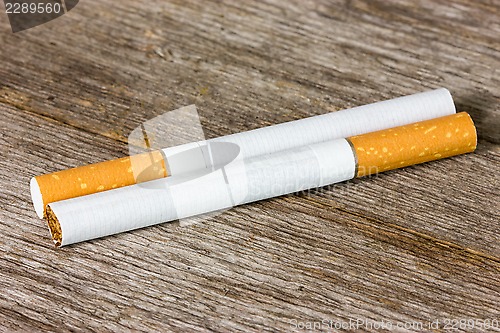 Image of  Cigarettes on the wooden floor