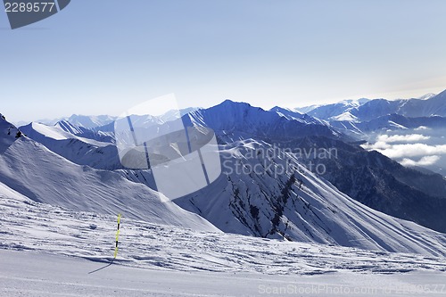 Image of Ski slope and mountains in haze