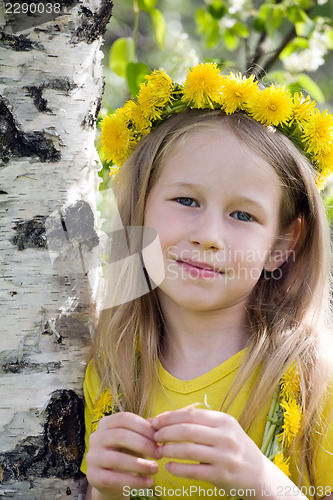Image of little blonde girl in dandelion wreath