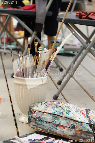 Image of Vivid paintbrushes at the atelier 