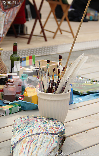 Image of Vivid paintbrushes at the atelier 