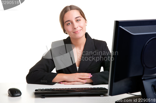 Image of Businesswoman At Office Desk