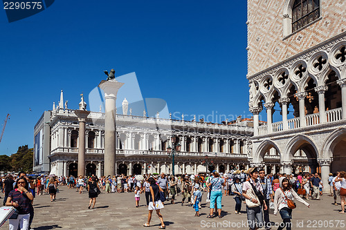 Image of ITALY, VENICE - JULY 2012: St Marco Square with crowd of tourist on July 16, 2012 in Venice. St Marco Square is the largest and most famous square in Venice.