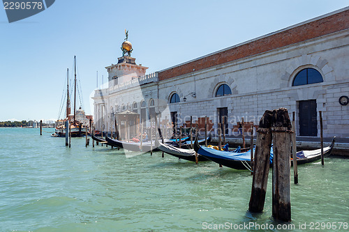 Image of ITALY, VENICE - JULY 2012: Floating at Grand canal on July 16, 2012 in Venice. The canal forms the major water-traffic corridors