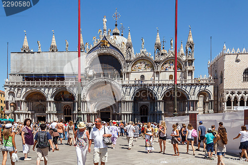 Image of ITALY, VENICE - JULY 2012: St Marco Square with crowd of tourist on July 16, 2012 in Venice. St Marco Square is the largest and most famous square in Venice.