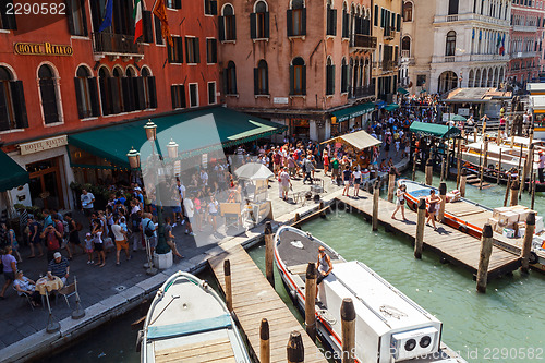 Image of ITALY, VENICE - JULY 2012: Crowd of tourist near Grand Canal on July 16, 2012 in Venice. More than 20 million tourists come to Venice annually. 