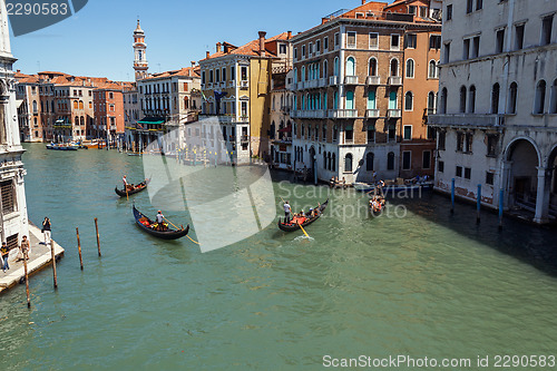 Image of ITALY, VENICE - JULY 2012 - A lot of traffic on the Grand Canal on July 16, 2012 in Venice. More than 20 million tourists come to Venice annually. 