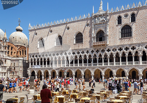 Image of ITALY, VENICE - JULY 2012: Global Financial crisis, no tourist relaxes at a street cafe at St Mark square on July 16, 2012 in Venice.