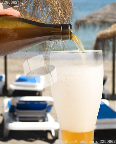Image of Beer and beach background