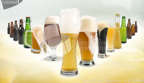 Image of Mug filled with beer and bottles