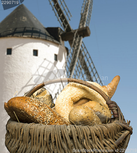 Image of Different breads and windmill in the background