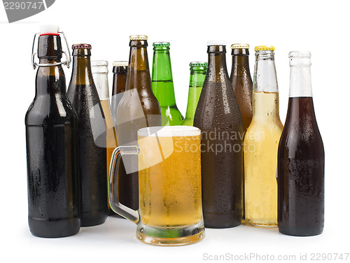 Image of Bottles of beer and beer mug. 