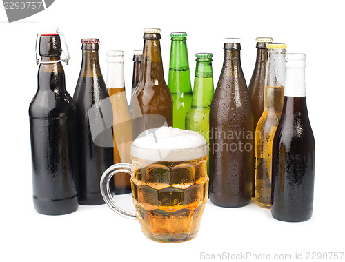 Image of Bottles of beer and beer mug. 