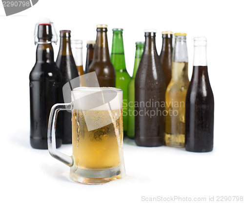 Image of Bottles of beer and beer mug. 