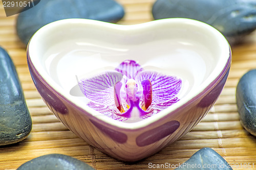 Image of heart bowl with orchid bloom