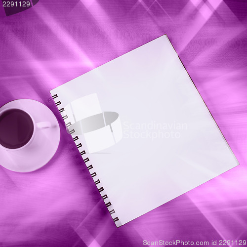 Image of White cup and white page