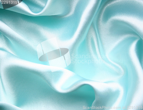 Image of Smooth elegant blue silk as background