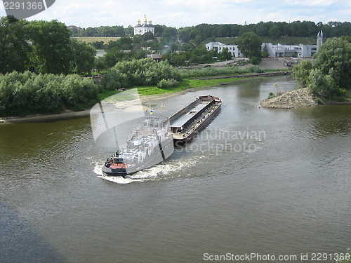 Image of empty barge going on the river