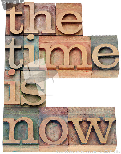 Image of the time is now in wood type