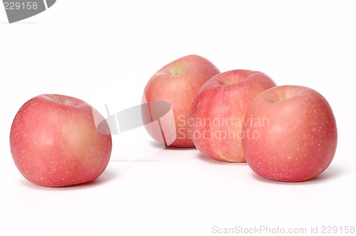 Image of four pink apples