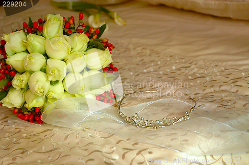 Image of Bouquet of flowers on bed