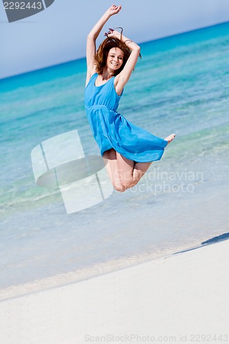 Image of beautful happy woman on the beach lifestyle summertime