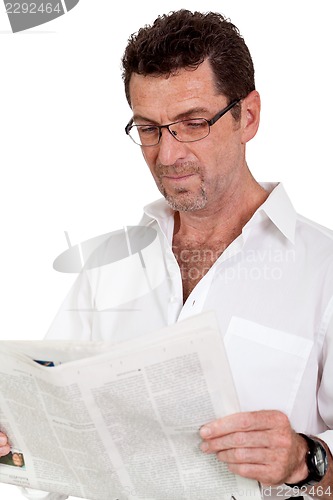 Image of attractive adult businessman reading newspaper isolated