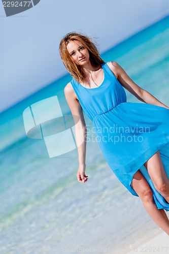 Image of beautful happy woman on the beach lifestyle summertime