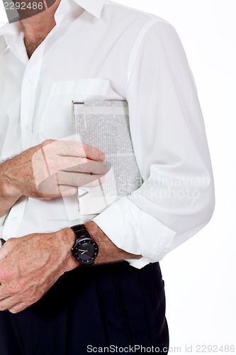 Image of attractive adult businessman reading newspaper isolated