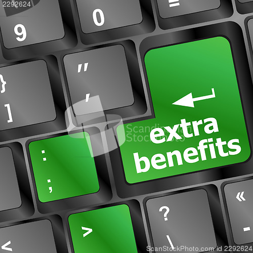 Image of extra benefits button on keyboard - business concept