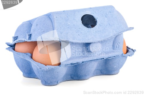 Image of Closed box with six brown eggs