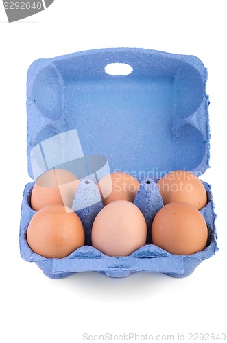 Image of Box with six brown eggs