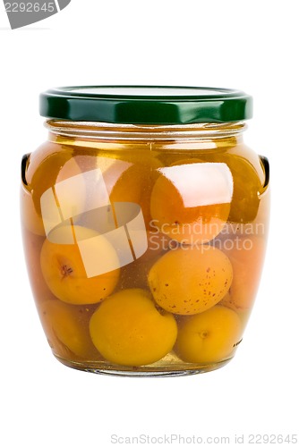 Image of Glass jar with preserved apricots