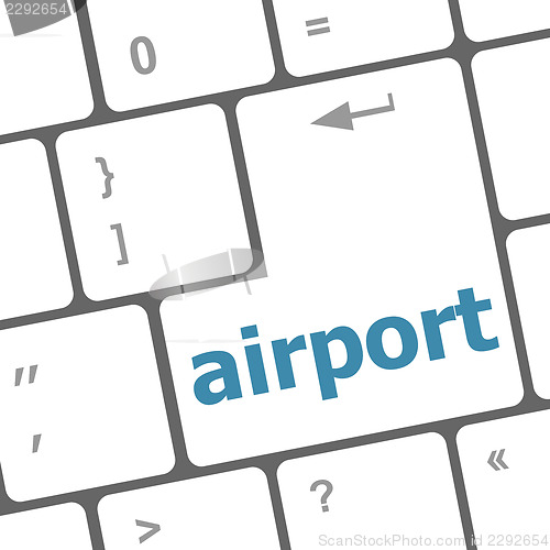 Image of airport on computer keyboard key enter button