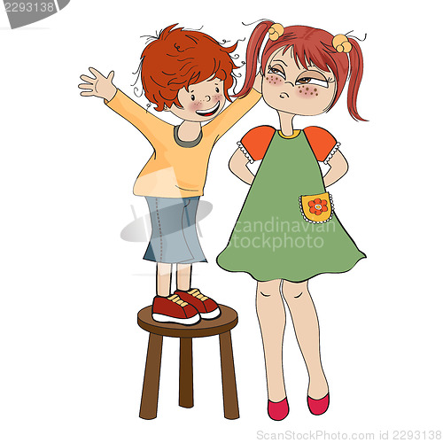 Image of small boy perched on a chair with funny girl