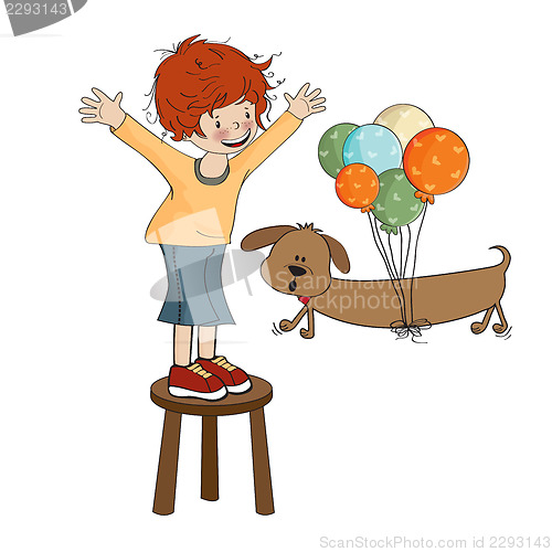 Image of little boy playing with his dog