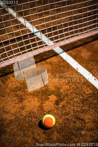 Image of tennis ball on court