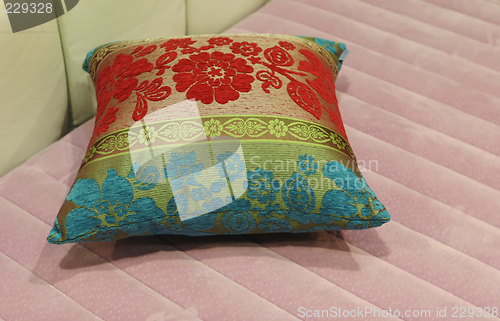 Image of Pillow on a pink matress