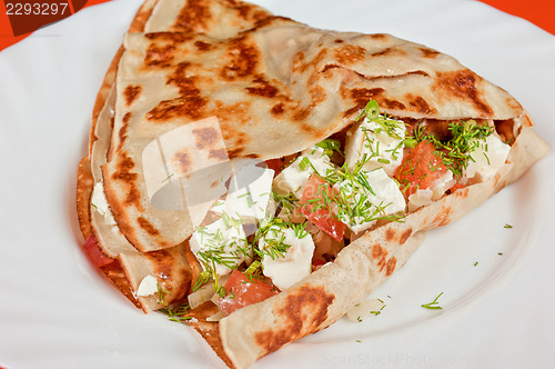 Image of pancakes with cheese and vegetables