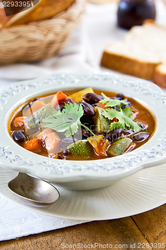 Image of Bean with zucchini and  carrot soup