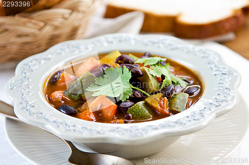 Image of Bean with zucchini and  carrot soup